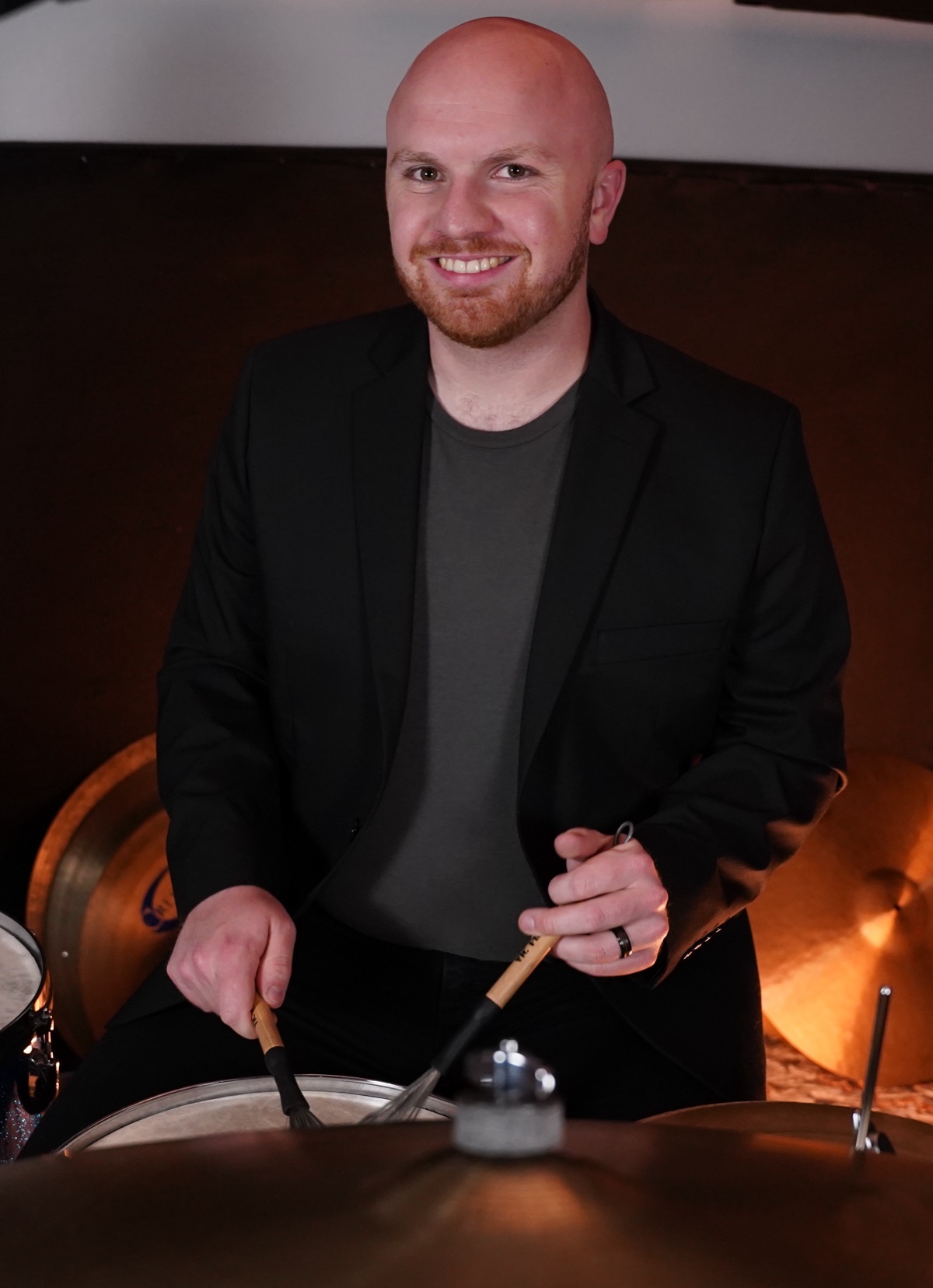 Ryan Shaw, Jazz session drummer, at the kit with brushes
